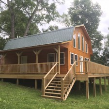custom home with wraparound deck